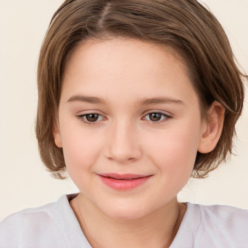 Joyful white child female with medium  brown hair and brown eyes