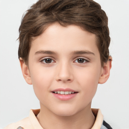 Joyful white child male with short  brown hair and brown eyes