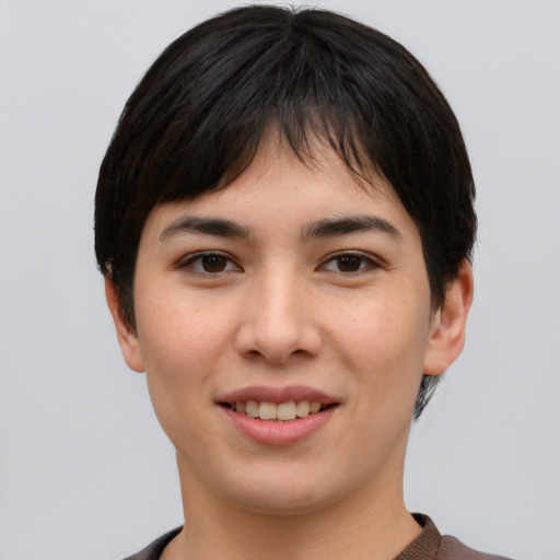 Joyful asian young-adult female with short  brown hair and brown eyes