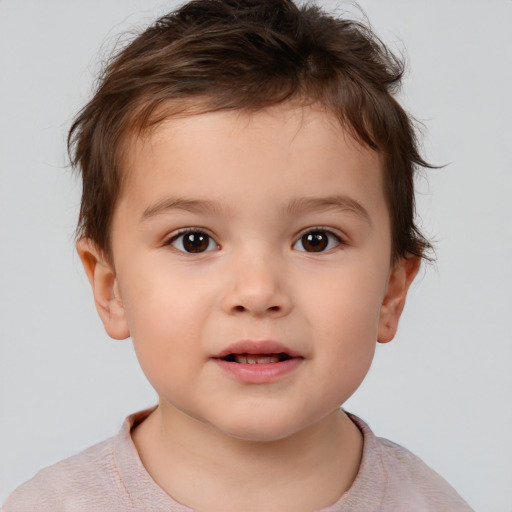 Joyful white child male with short  brown hair and brown eyes