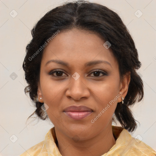 Joyful black adult female with medium  brown hair and brown eyes