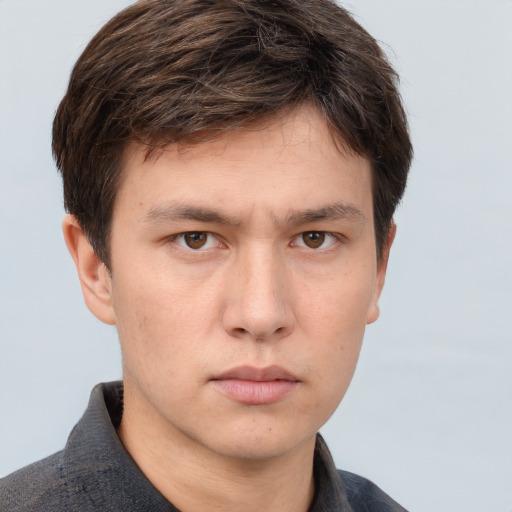 Neutral white young-adult male with short  brown hair and grey eyes
