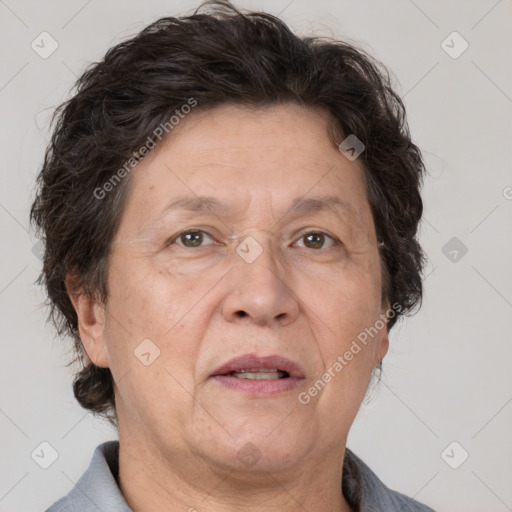 Joyful white middle-aged female with short  brown hair and brown eyes