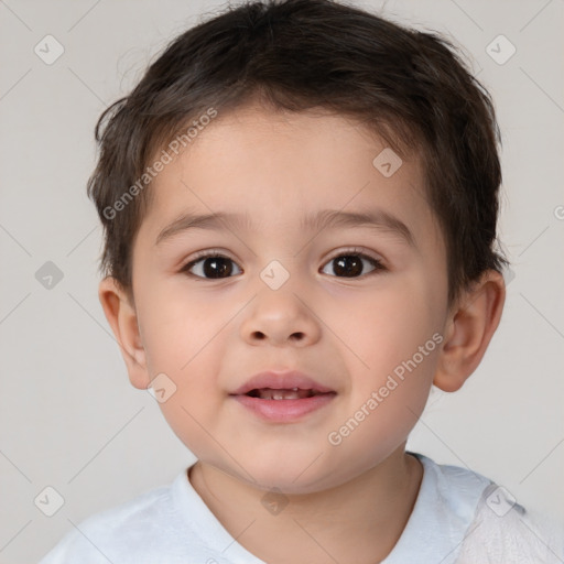 Joyful white child male with short  brown hair and brown eyes