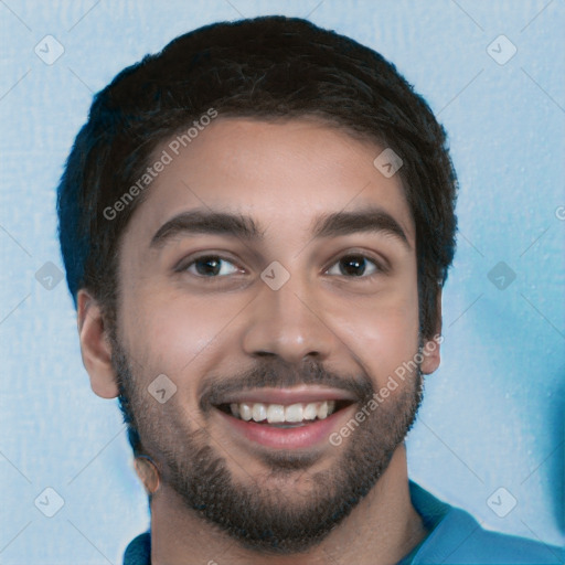 Joyful white young-adult male with short  black hair and brown eyes