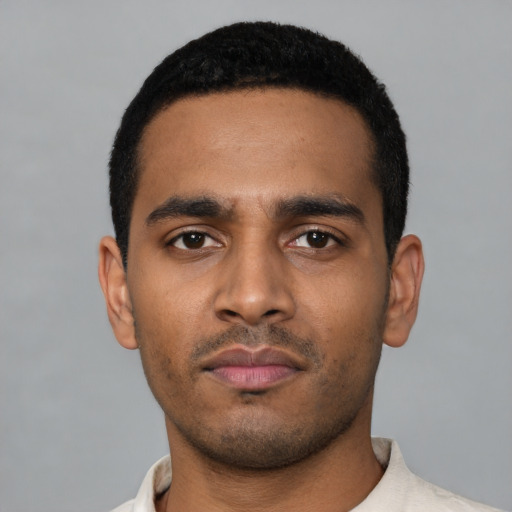 Neutral latino young-adult male with short  black hair and brown eyes