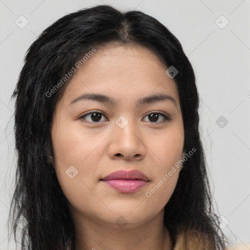 Joyful asian young-adult female with long  brown hair and brown eyes