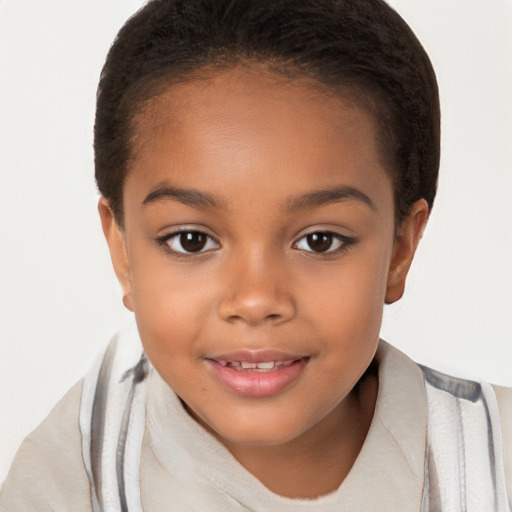 Joyful latino child female with short  brown hair and brown eyes