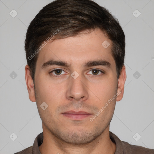 Neutral white young-adult male with short  brown hair and brown eyes