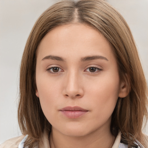 Neutral white young-adult female with medium  brown hair and brown eyes