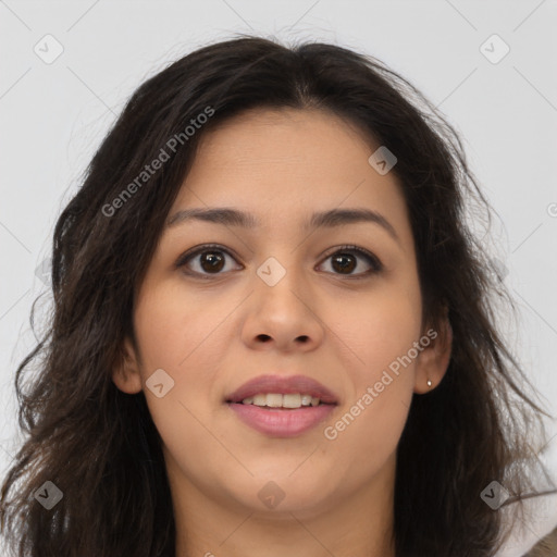 Joyful latino young-adult female with long  brown hair and brown eyes