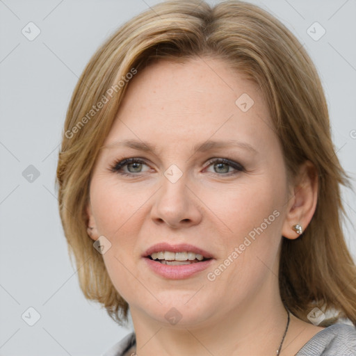 Joyful white young-adult female with medium  brown hair and blue eyes