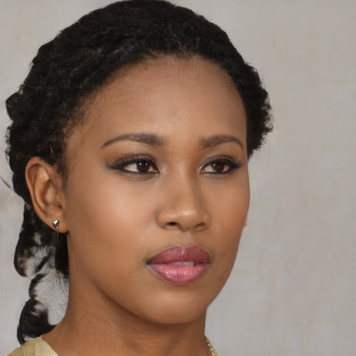 Neutral black young-adult female with medium  black hair and brown eyes