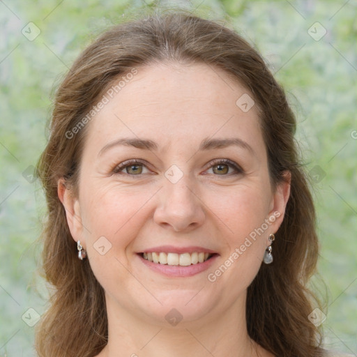 Joyful white young-adult female with medium  brown hair and green eyes