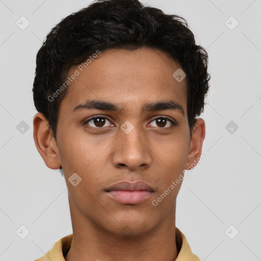 Neutral latino young-adult male with short  brown hair and brown eyes