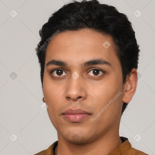 Neutral latino young-adult male with short  black hair and brown eyes