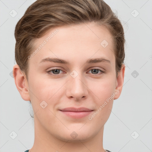 Joyful white young-adult female with short  brown hair and grey eyes