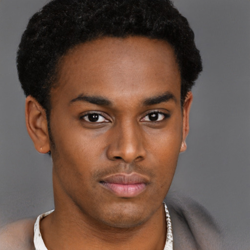 Neutral black young-adult male with short  brown hair and brown eyes