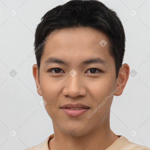 Joyful asian young-adult male with short  brown hair and brown eyes