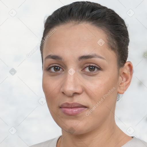 Joyful white young-adult female with short  brown hair and brown eyes