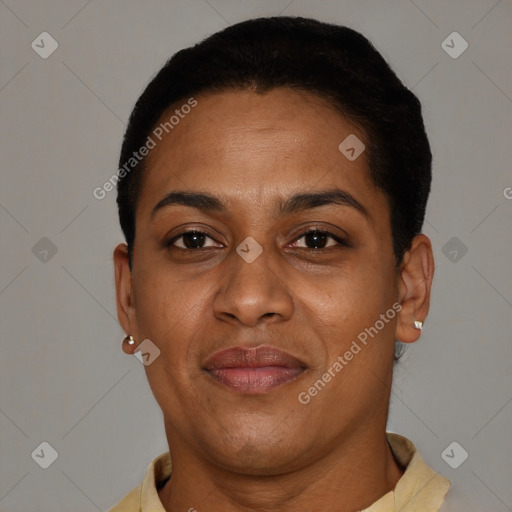 Joyful black adult female with short  brown hair and brown eyes