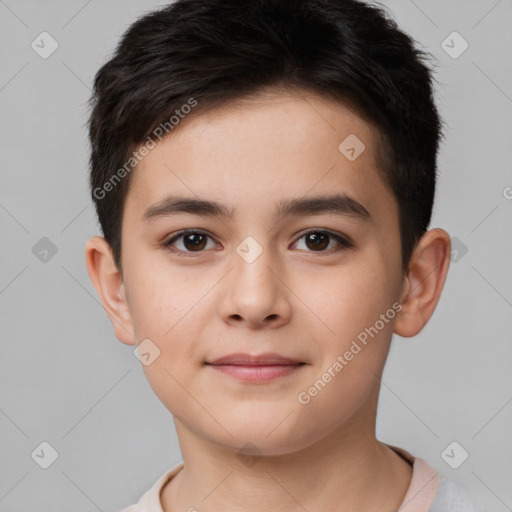 Joyful white child male with short  brown hair and brown eyes