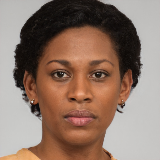 Neutral black young-adult female with short  brown hair and brown eyes