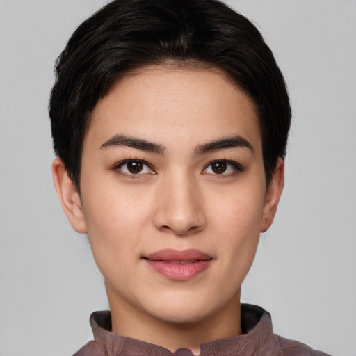 Joyful white young-adult female with short  black hair and brown eyes