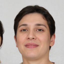 Joyful white young-adult male with medium  brown hair and brown eyes