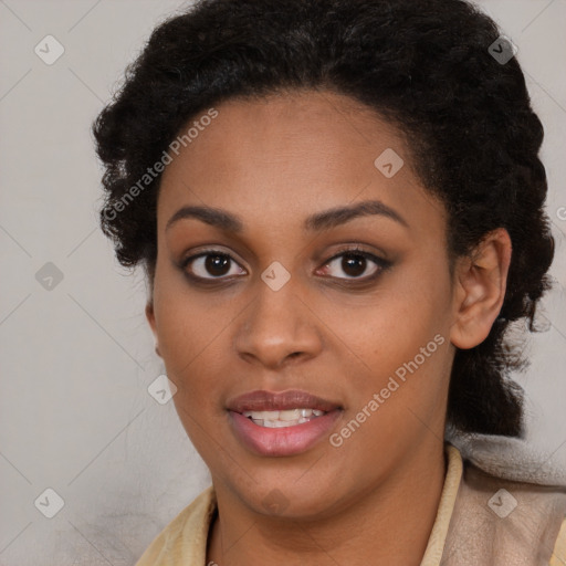 Joyful black young-adult female with long  brown hair and brown eyes