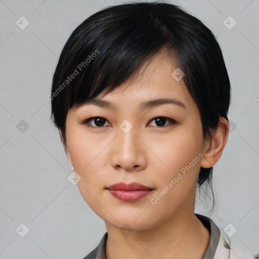 Neutral asian young-adult female with medium  black hair and brown eyes