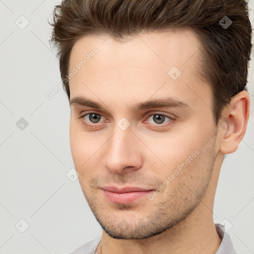 Neutral white young-adult male with short  brown hair and brown eyes