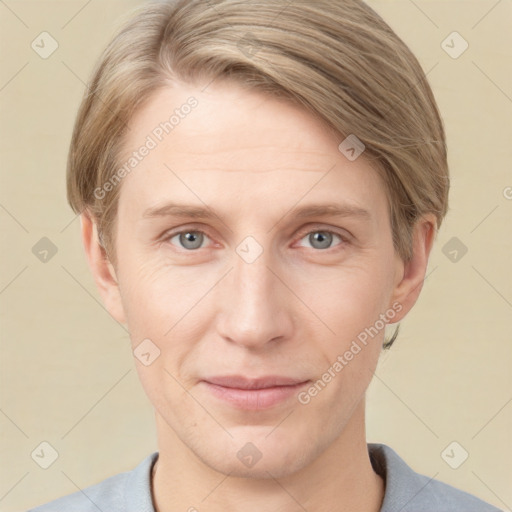 Joyful white adult male with short  brown hair and grey eyes