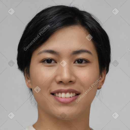 Joyful asian young-adult female with medium  black hair and brown eyes