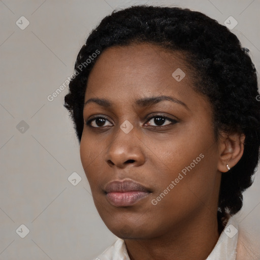 Neutral black young-adult female with short  black hair and brown eyes