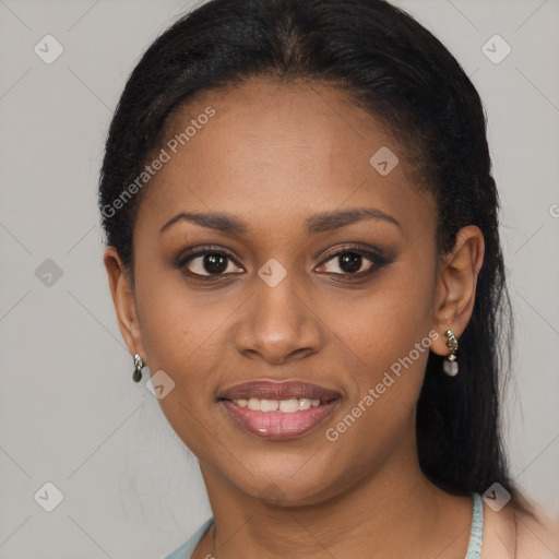 Joyful black young-adult female with long  brown hair and brown eyes