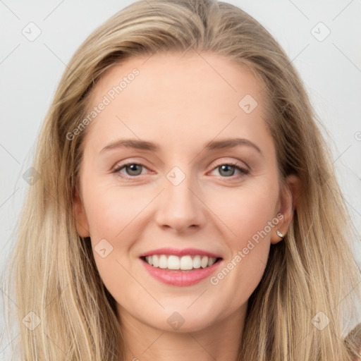 Joyful white young-adult female with long  brown hair and grey eyes