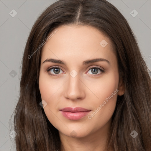 Neutral white young-adult female with long  brown hair and brown eyes