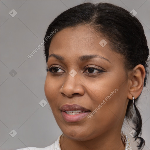 Joyful black young-adult female with medium  brown hair and brown eyes