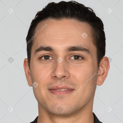 Joyful white young-adult male with short  brown hair and brown eyes