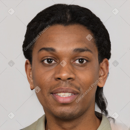 Joyful black young-adult male with short  black hair and brown eyes