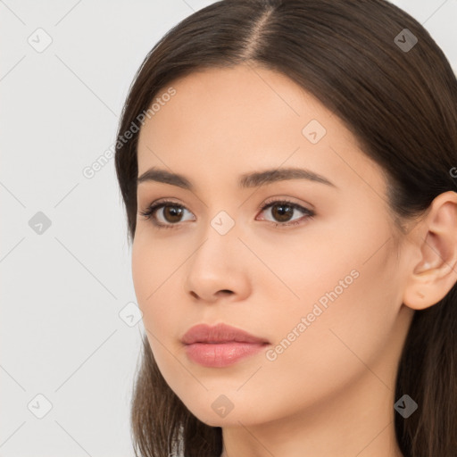 Neutral white young-adult female with long  brown hair and brown eyes