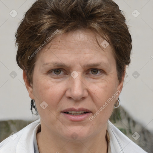 Joyful white adult female with short  brown hair and brown eyes