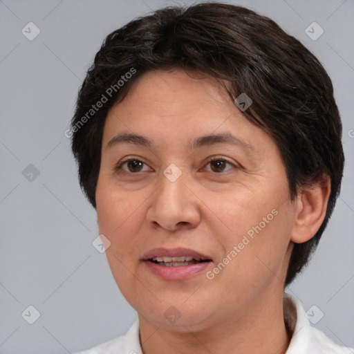 Joyful white adult female with short  brown hair and brown eyes