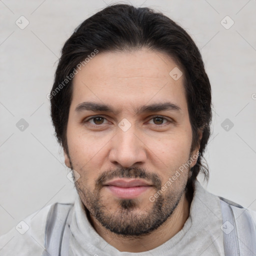 Joyful white young-adult male with short  black hair and brown eyes