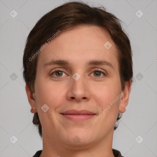 Joyful white young-adult female with short  brown hair and grey eyes