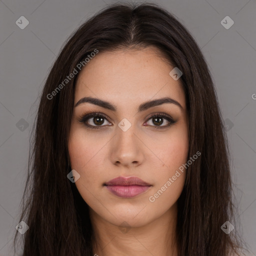 Neutral white young-adult female with long  brown hair and brown eyes