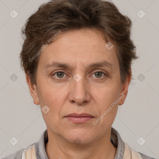 Joyful white adult female with short  brown hair and brown eyes