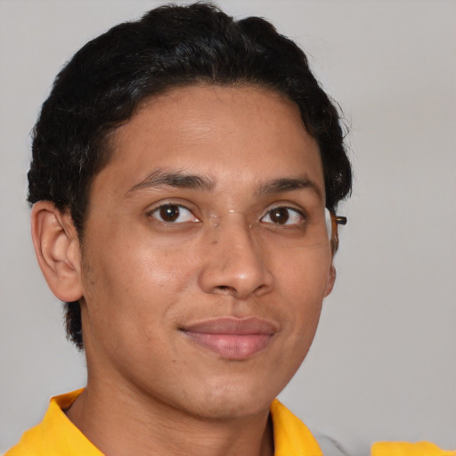 Joyful asian young-adult male with short  brown hair and brown eyes