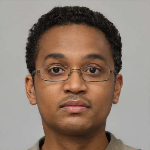 Neutral black young-adult male with short  brown hair and brown eyes